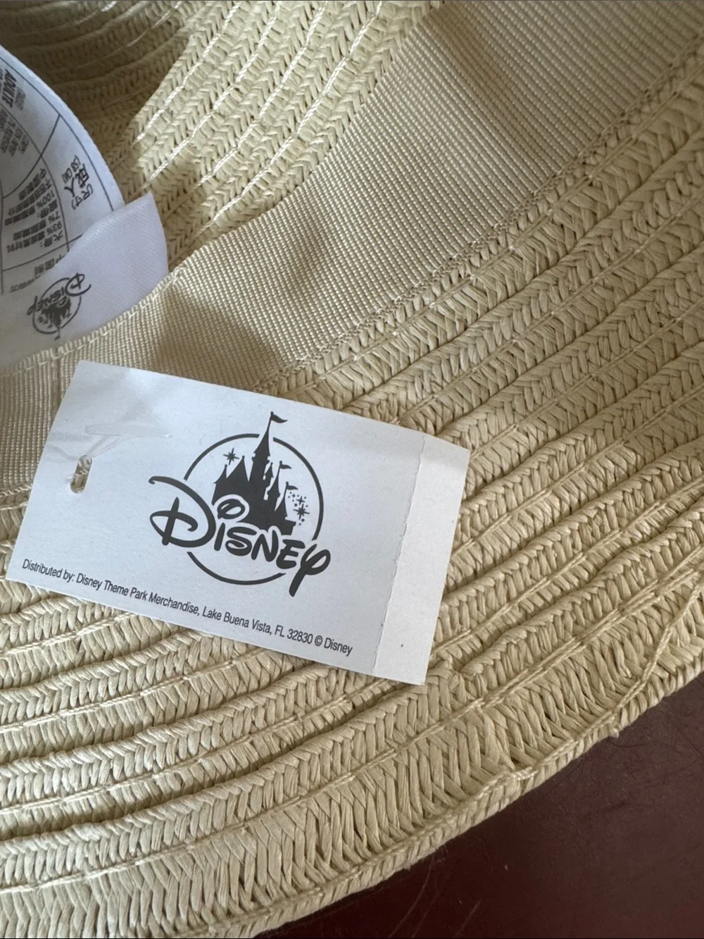 Disney Natural Straw Bucket Hat with Purple Floral Band. NWT